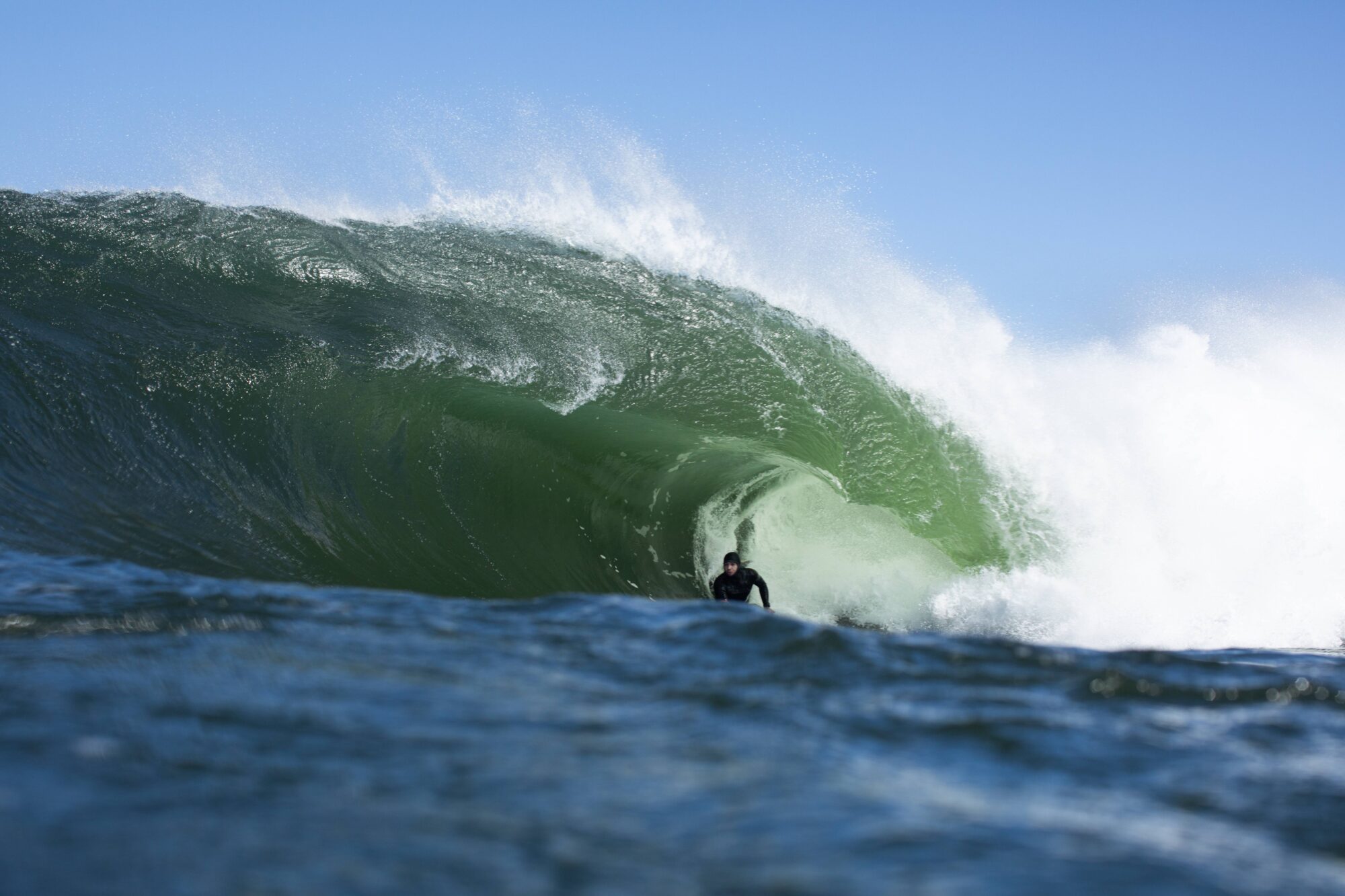 South African bodyboarder sonquers massive barreling wave at Tand.